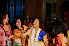 Maharani with turmeric paste all over her. Maharani with turmeric paste all over her.