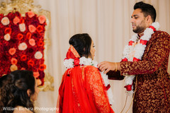 Indian bride and groom at their Jaimala Ceremony. Indian bride and groom at their Jaimala Ceremony.