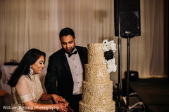 Marvelous Indian wedding cake cutting scene. Marvelous Indian wedding cake cutting scene.