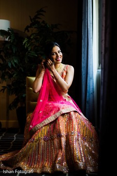 Gorgeous Indian bride putting her ceremony Jewelry. Gorgeous Indian bride putting her ceremony Jewelry.