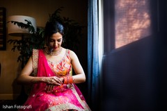 Maharani putting her bangles on. Maharani putting her bangles on.