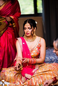 See this lovely Indian bride at her pre-wedding rituals. See this lovely Indian bride at her pre-wedding rituals.