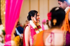 Sweet indian bride at her wedding varmala ritual. Sweet indian bride at her wedding varmala ritual.