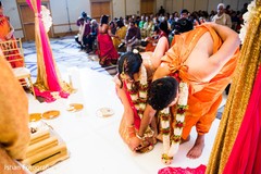 Saptapadi ritual when stepping on nuts with toes. Saptapadi ritual when stepping on nuts with toes.