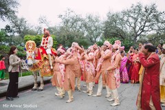 Indian groom with groomsmen at baraat celebration. Indian groom with groomsmen at baraat celebration.