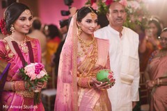 Enchanting Indian bride holding the ceremony coconut. Enchanting Indian bride holding the ceremony coconut.