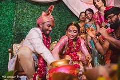 Indian couple at the pot ritual. Indian couple at the pot ritual.