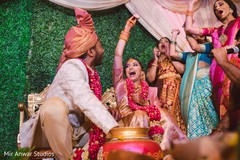 Indian bride found the ring on the pot. Indian bride found the ring on the pot.