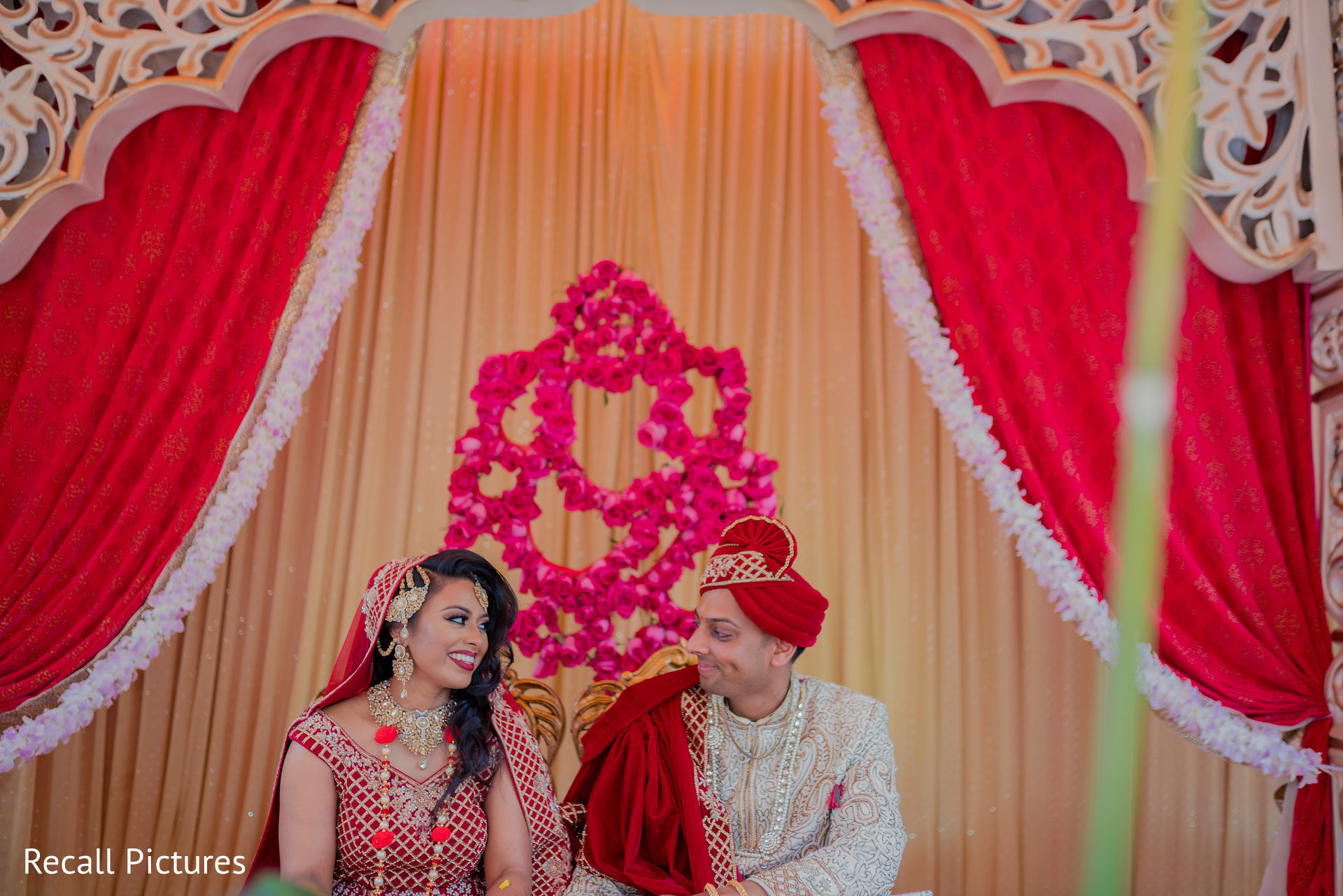 Joyful Indian couple at ceremony capture. | Photo 218643