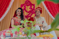 Dazzling Indian bride and groom at their wedding ceremony. Dazzling Indian bride and groom at their wedding ceremony.