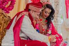 Sweet indian bride and groom during wedding ceremony Sweet indian bride and groom during wedding ceremony