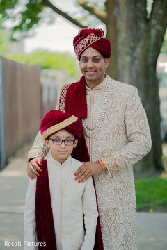Charming Indian groom and pageboy capture. Charming Indian groom and pageboy capture.