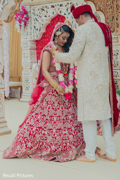 Indian bride and groom at their Jaimala Ceremony. Indian bride and groom at their Jaimala Ceremony.