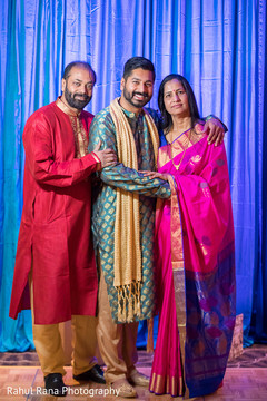 Indian groom with his parents Indian groom with his parents