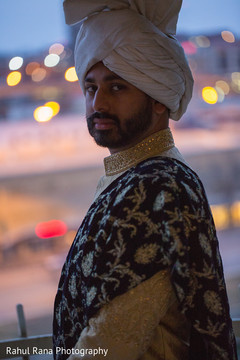 Elegant groom posing for pictures Elegant groom posing for pictures