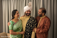 Indian groom with his parents Indian groom with his parents