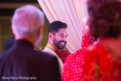 Indian groom smiling during the ceremony Indian groom smiling during the ceremony