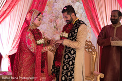 Indian bride placing the ring on the Maharani Indian bride placing the ring on the Maharani