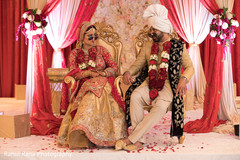 Indian couple posing funny for pictures Indian couple posing funny for pictures