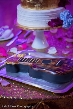 Guitar shaped cake ready for reception Guitar shaped cake ready for reception