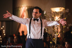 Indian groom showing some dance moves. Indian groom showing some dance moves.