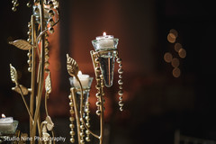 Elegant Indian wedding table candles decor. Elegant Indian wedding table candles decor.