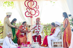 Joyful couple with guests Joyful couple with guests