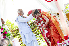 Maharani and Indian groom being blessed Maharani and Indian groom being blessed