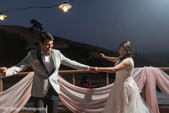 Indian bride and groom enjoying the dancing Indian bride and groom enjoying the dancing