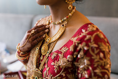 Indian bride wearing her polki necklace choker. Indian bride wearing her polki necklace choker.