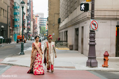 Indian bride and groom walking hand in hand. Indian bride and groom walking hand in hand.