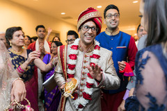 Indian groom holding a ceremony coconut. Indian groom holding a ceremony coconut.