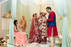 Indian bride and groom exchanging garlands ceremony. Indian bride and groom exchanging garlands ceremony.