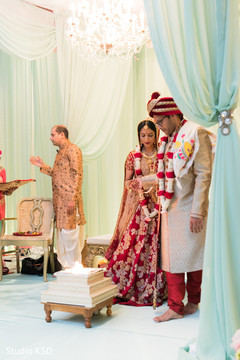 Glamorous Indian couple walking around sacred fire. Glamorous Indian couple walking around sacred fire.