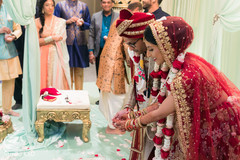Maharani and rajah making offerings to sacred fire. Maharani and rajah making offerings to sacred fire.