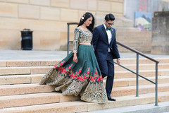 Enchanting Indian couple walking out doors. Enchanting Indian couple walking out doors.