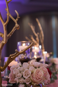 Romantic Indian wedding table roses decorations. Romantic Indian wedding table roses decorations.