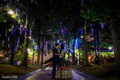 Incredible Indian couple outdoors at reception. Incredible Indian couple outdoors at reception.
