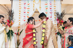 Indian groom receiving his garland Indian groom receiving his garland