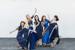 Indian bridesmaids playfully posing for the camera Indian bridesmaids playfully posing for the camera