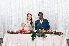 Indian couple at their sweethearts table Indian couple at their sweethearts table