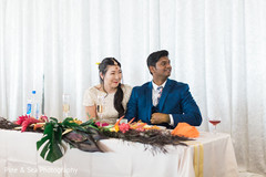Indian lovebirds listening to their toast Indian lovebirds listening to their toast