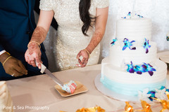 Beautiful indian wedding cake cutting scene Beautiful indian wedding cake cutting scene