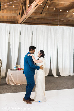 Beautiful indian couple having their first dance Beautiful indian couple having their first dance