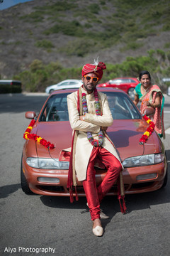 Charming Indian groom posing on his baraat vehicle. Charming Indian groom posing on his baraat vehicle.