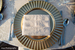 Golden plate for Indian wedding reception table. Golden plate for Indian wedding reception table.