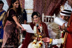 Indian bride reading her vows Indian bride reading her vows
