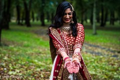 Indian bride showing her mehndi design Indian bride showing her mehndi design