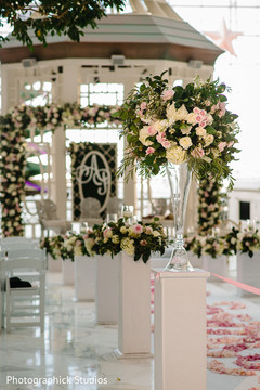 Elegant Indian wedding aisle decor. Elegant Indian wedding aisle decor.