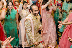 See this charming Indian groom at Garba dance. See this charming Indian groom at Garba dance.